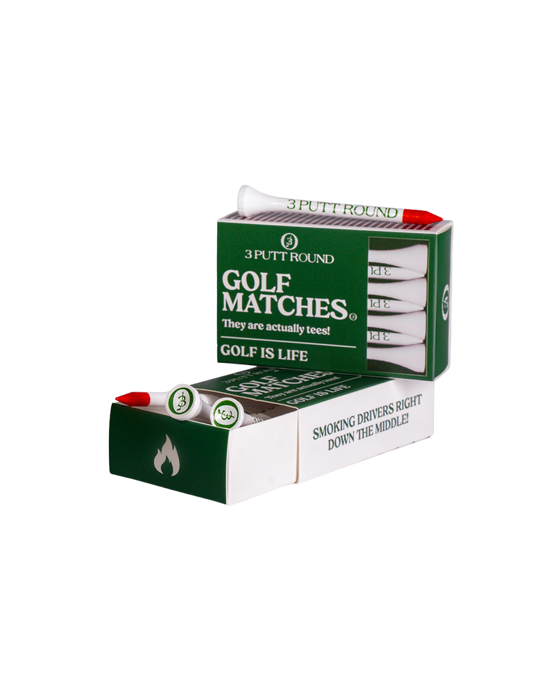 Two green golf tees from Three Putt Round's matchbox, neatly arranged on a white background.