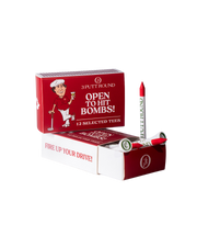 Box of Three Putt Round Red Golf Tees with a matchbox-style design, neatly arranged on a white background.